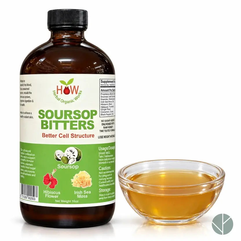 Soursop bitters bottle beside a glass of the herbal liquid
